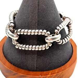 Vintage Bergere Silver Tone Wrapped Oval Curved Link Fold Over Clasp Bracelet